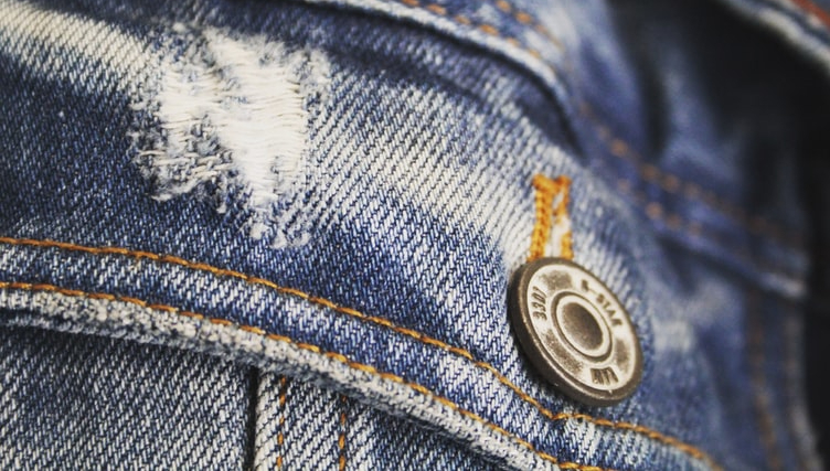 close-up-of-denim-pants-with-button