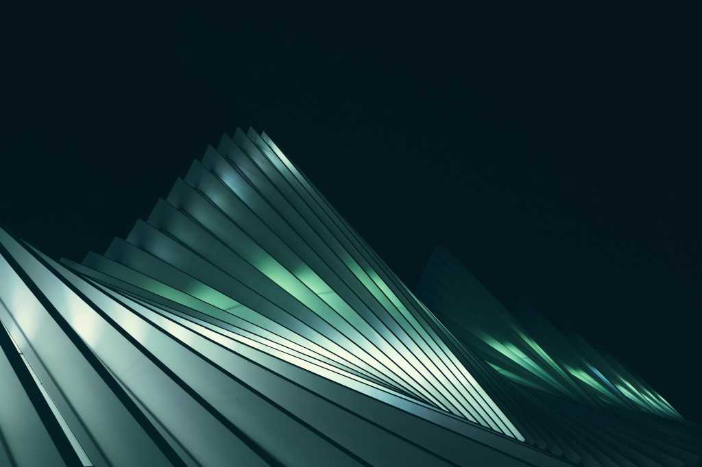 Abstract architecture made of long, connected panels like scales.