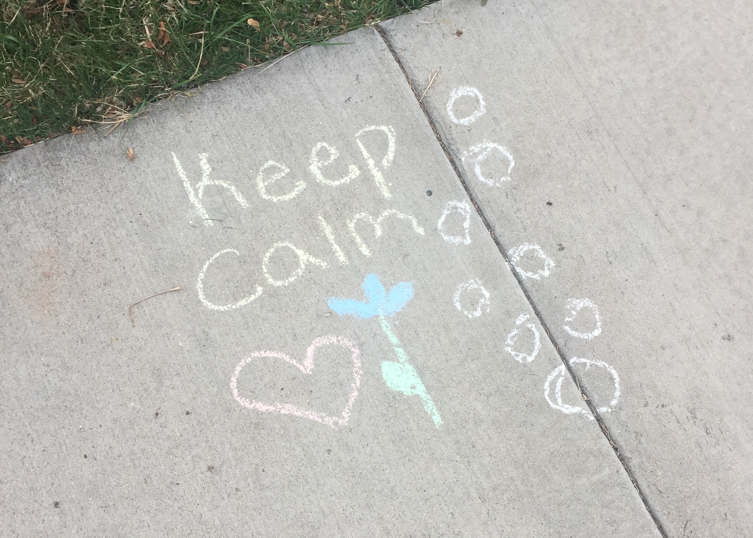 keep-calm-written-in-sidewalk-chalk-with-pink-heart-and-blue-flower