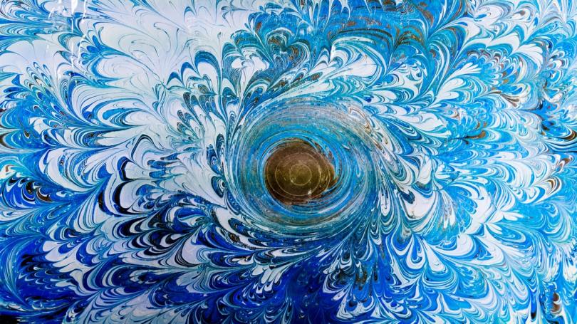 marbled-swirl-blue-and-white-with-brown-center-of-spiral